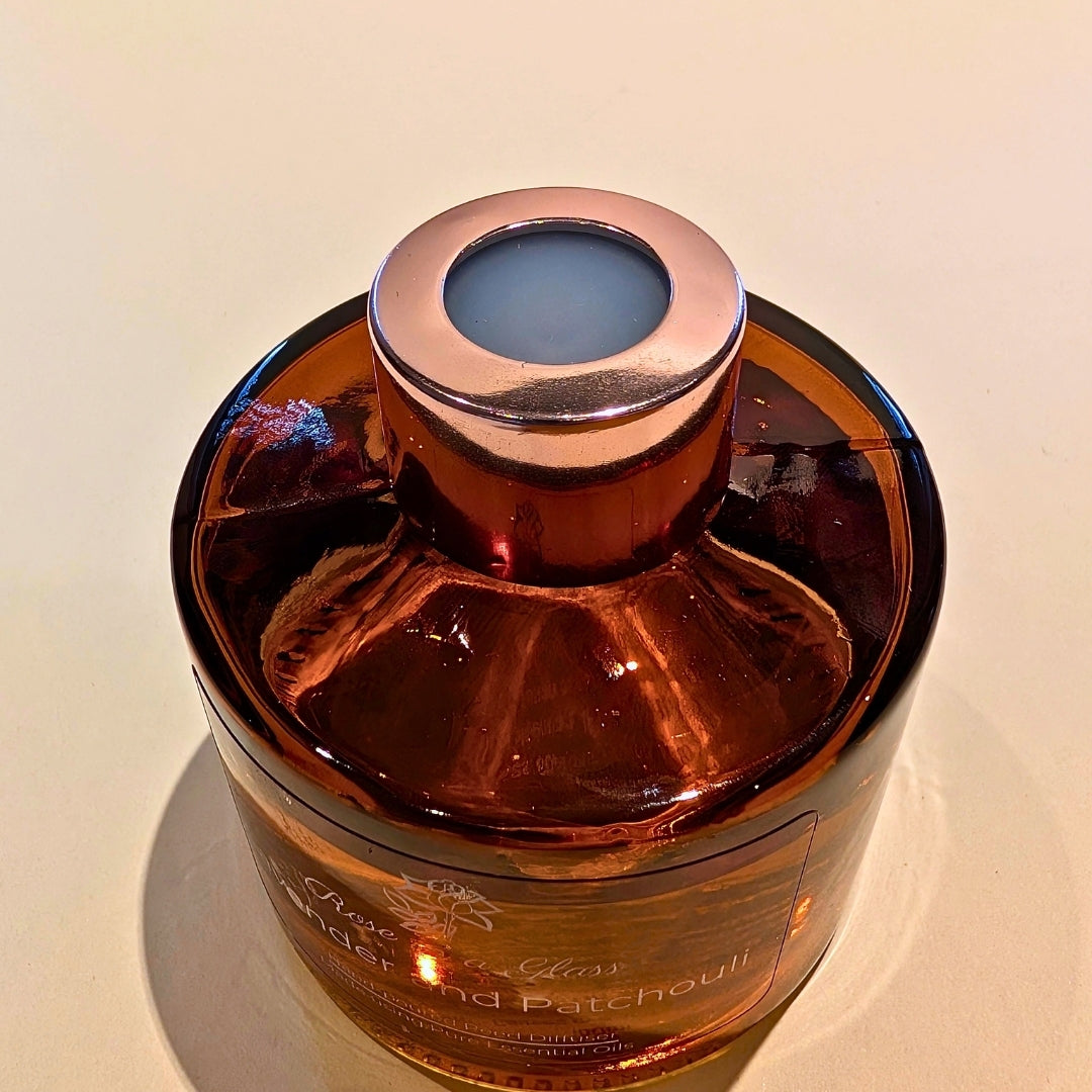 Handcrafted Lavender and Patchouli aromatherapy diffuser reusable glass bottle  and travel plug to find calm and focus UK