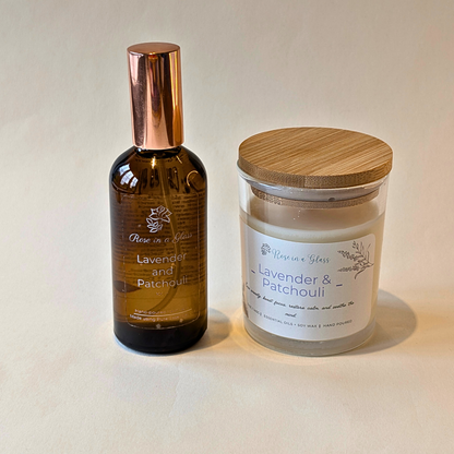 Matching Lavender and Patchouli candle and spray gift set in reusable glass for aromatherapy wellness