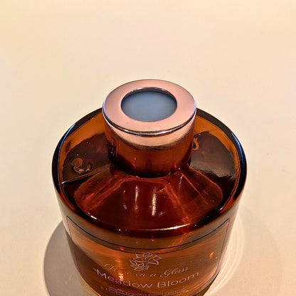 Handcrafted Meadow Bloom aromatherapy diffuser reusable glass bottle and travel plug to find calm and focus UK