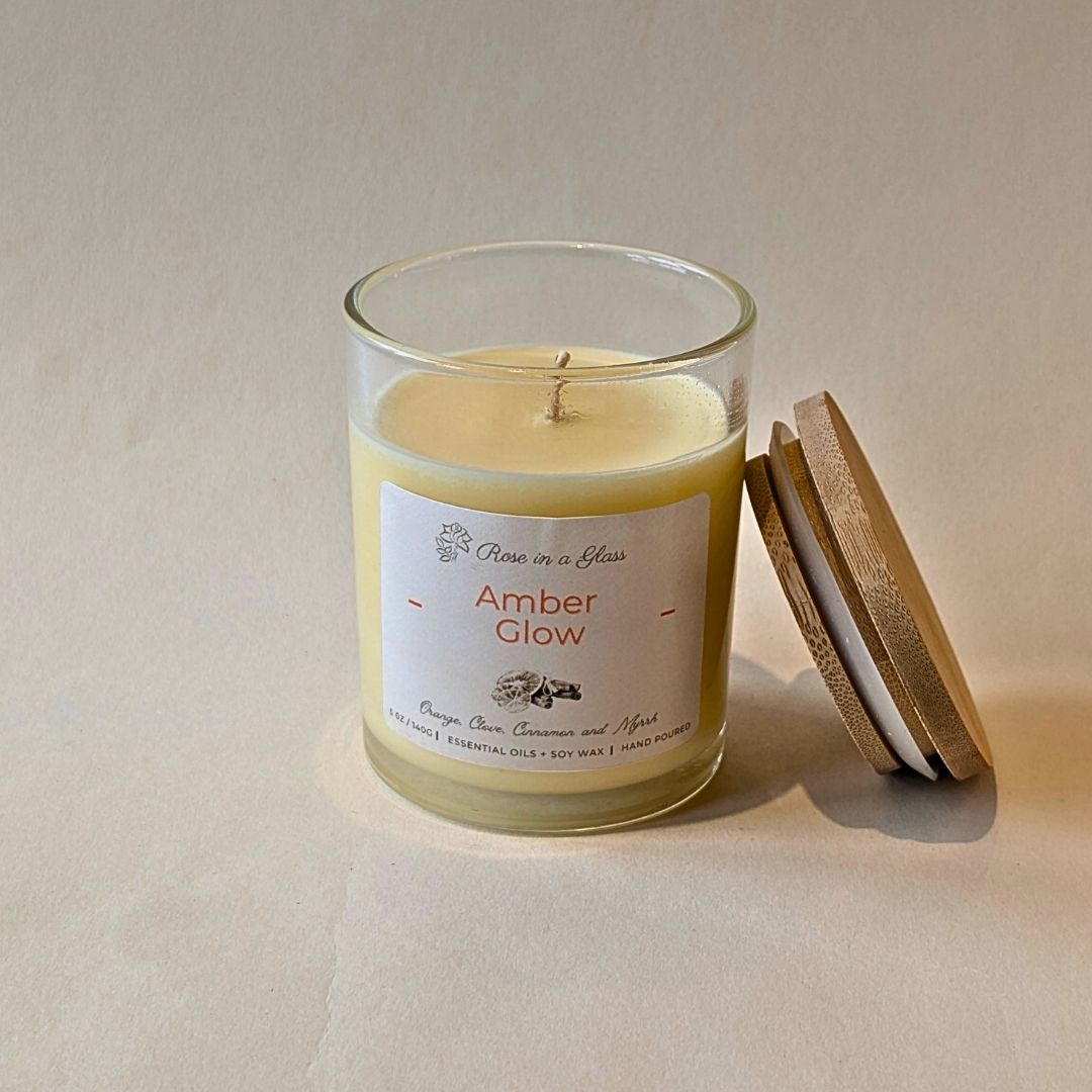 Soy candle in the Amber Glow aromatherapy wellness gift set to find calm focus and tranquillity